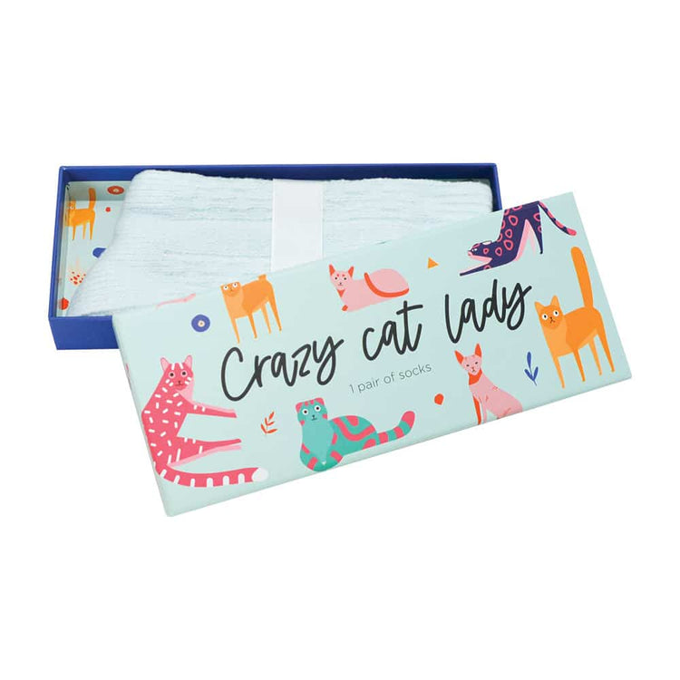 Crazy cat lady printed box and plain pale blue socks on a white background. Perfect for gift boxes for her.